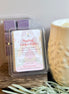 Lavender and Sage scented soy wax melts packaging with a wax melter on a wooden surface