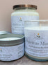 Three 'Spiritus Mundi' nag champa candles of different sizes on a neutral background