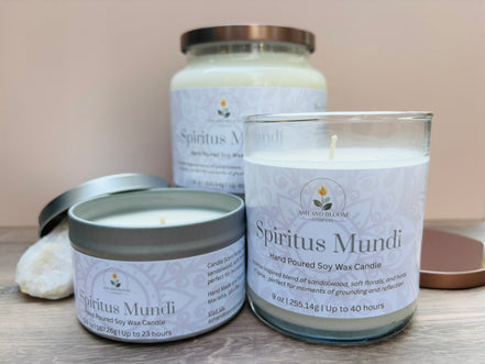 Three 'Spiritus Mundi' nag champa candles of different sizes on a neutral background