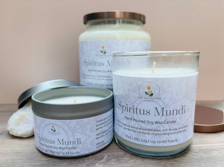Three 'Spiritus Mundi' nag champa candles of different sizes on a neutral background