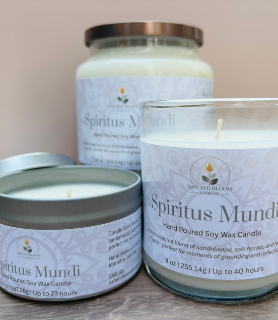 Three 'Spiritus Mundi' nag champa candles of different sizes on a neutral background